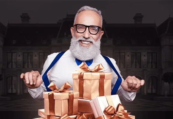 The Mr Fortune host with a stack of gift boxes